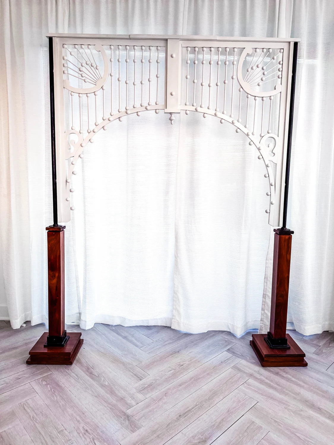 White Wooden Wedding Arch