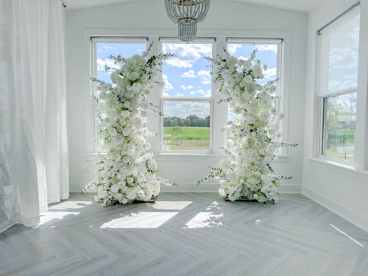 White floral arches