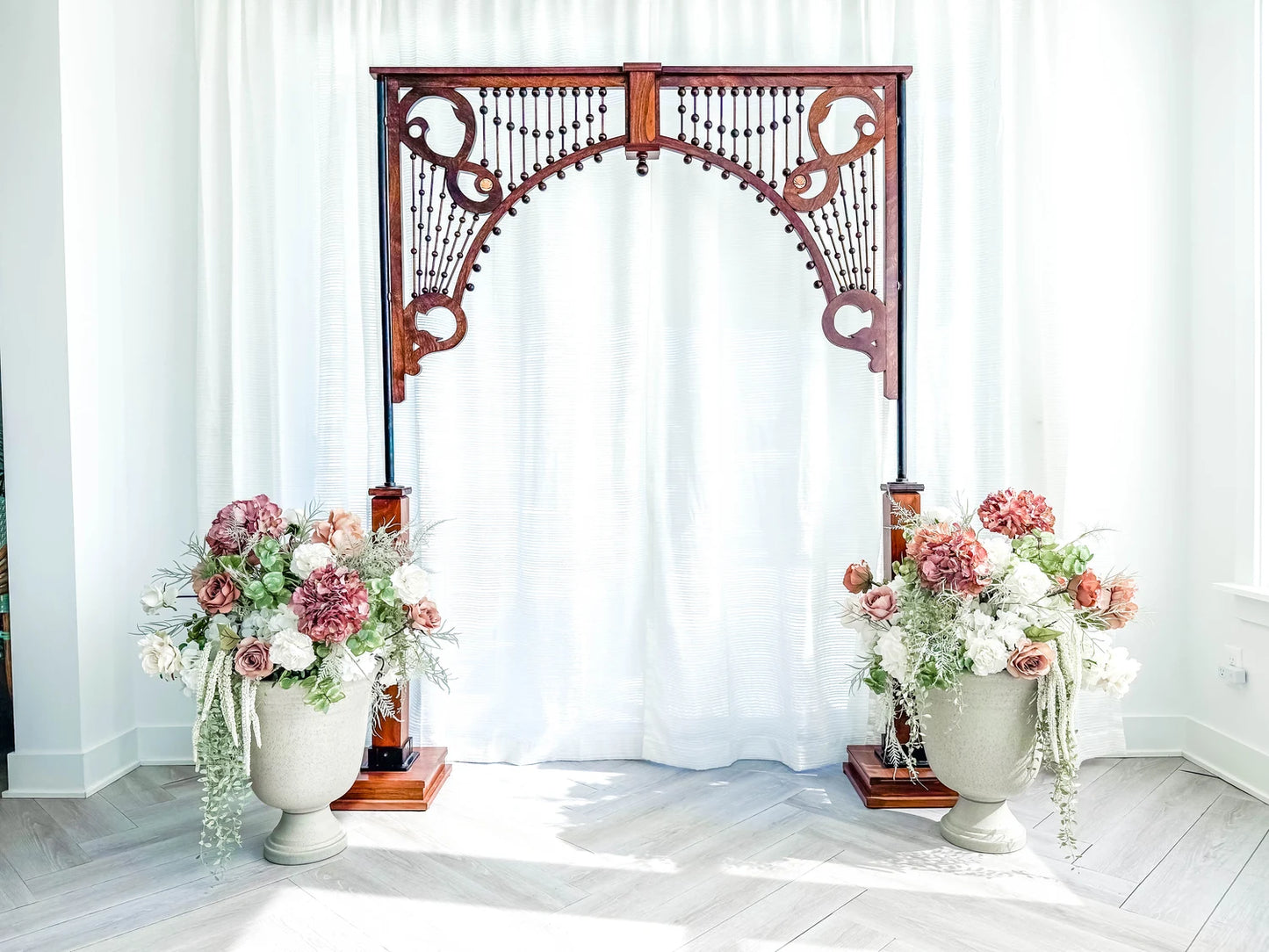 Wooden Arch with Floral Urns